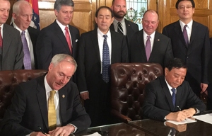 Gov. Asa Hutchinson and Hongxin Li