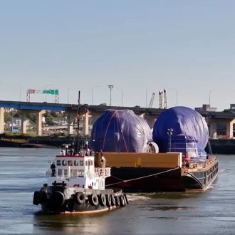 Irving Pulp & Paper - barge carrying components